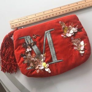 Anthropologie monogram velvet pouch with tassel.